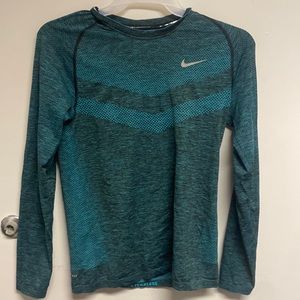 Dry Fit Nike running top with thumb slots.